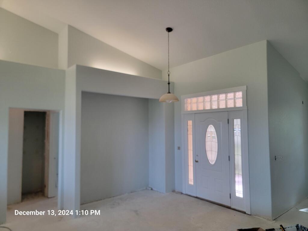 Remodeling Home Entry with new door, side windows and flooring